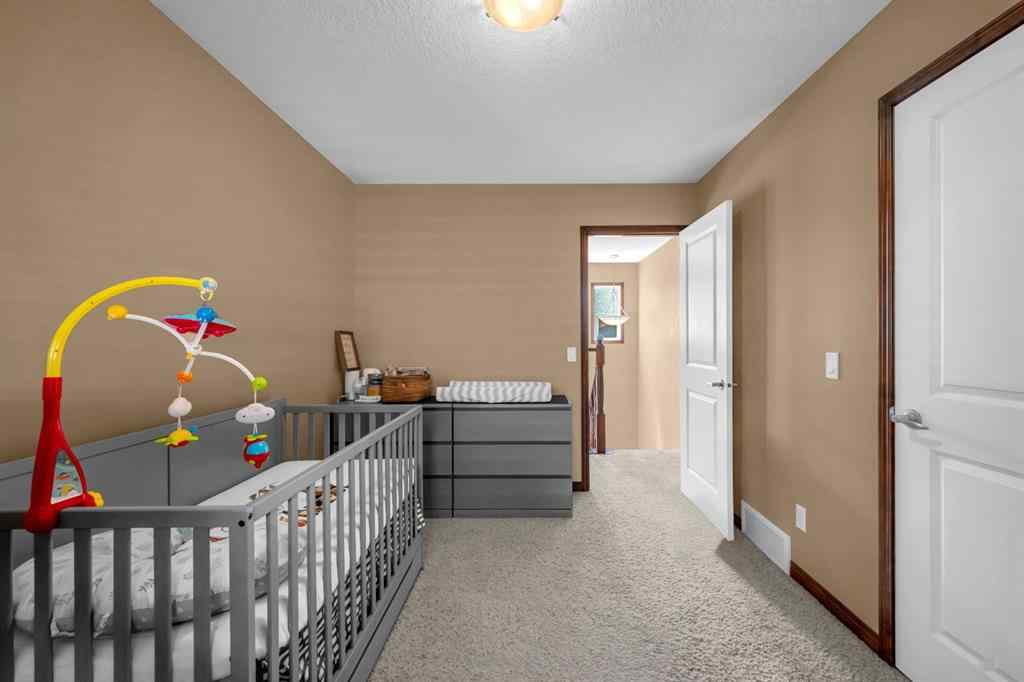 MLS® A2246423 - 1011 Kings Heights Road SE in Kings Heights Airdrie, Residential