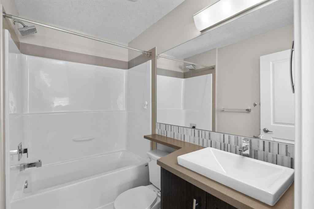MLS® A2246425 - 229 Ascot Circle SW in Aspen Woods Calgary, Residential
