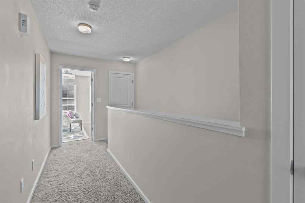 MLS® A2246425 - 229 Ascot Circle SW in Aspen Woods Calgary, Residential