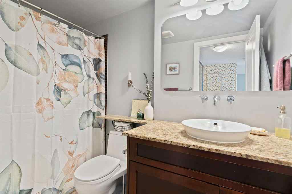 MLS® A2246437 - Unit #404 429 14 Street NW in Hillhurst Calgary, Residential