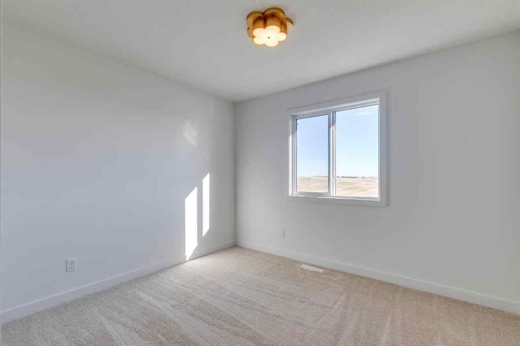 MLS® A2246485 - 267 Sora Terrace SE in Hotchkiss Calgary, Residential