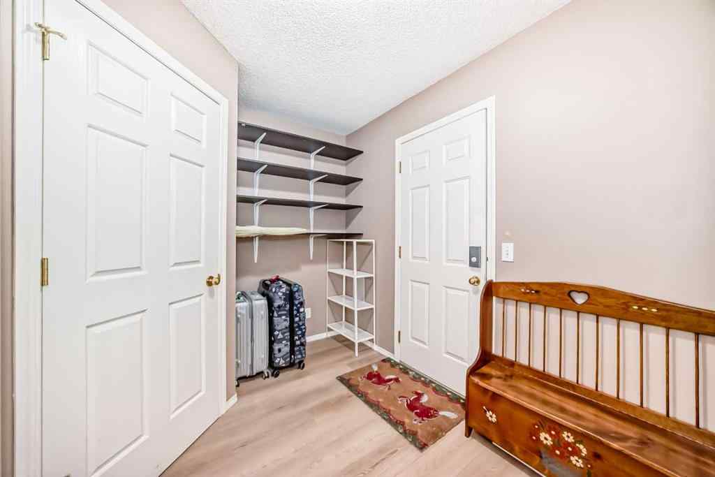 MLS® A2246486 - 65 Cougarstone Circle SW in Cougar Ridge Calgary, Residential