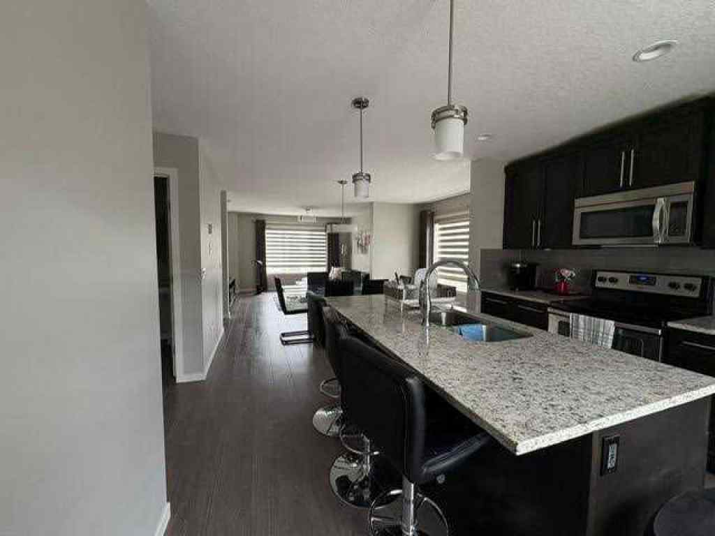 MLS® A2246494 - 202 Evansridge Park NW in Evanston Calgary, Residential