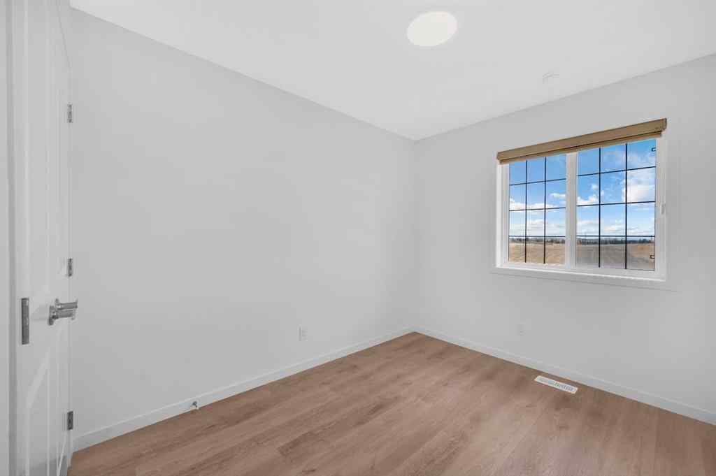 MLS® A2246515 - 132 Hotchkiss Gate SE in Hotchkiss Calgary, Residential