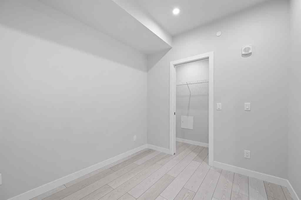 MLS® A2246535 - Unit #209 110 18A Street NW in West Hillhurst Calgary, Residential
