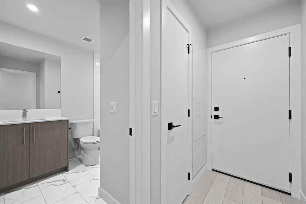 MLS® A2246535 - Unit #209 110 18A Street NW in West Hillhurst Calgary, Residential