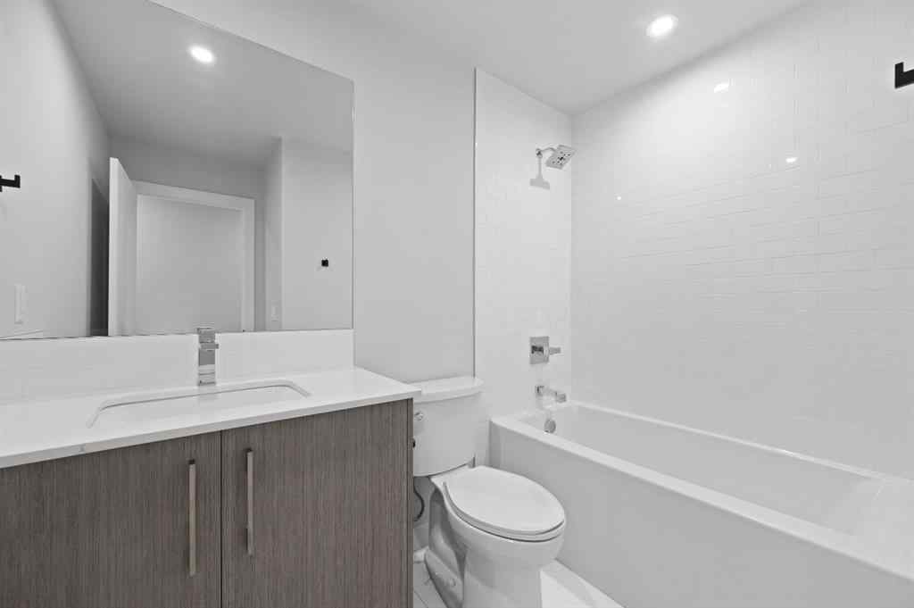 MLS® A2246535 - Unit #209 110 18A Street NW in West Hillhurst Calgary, Residential