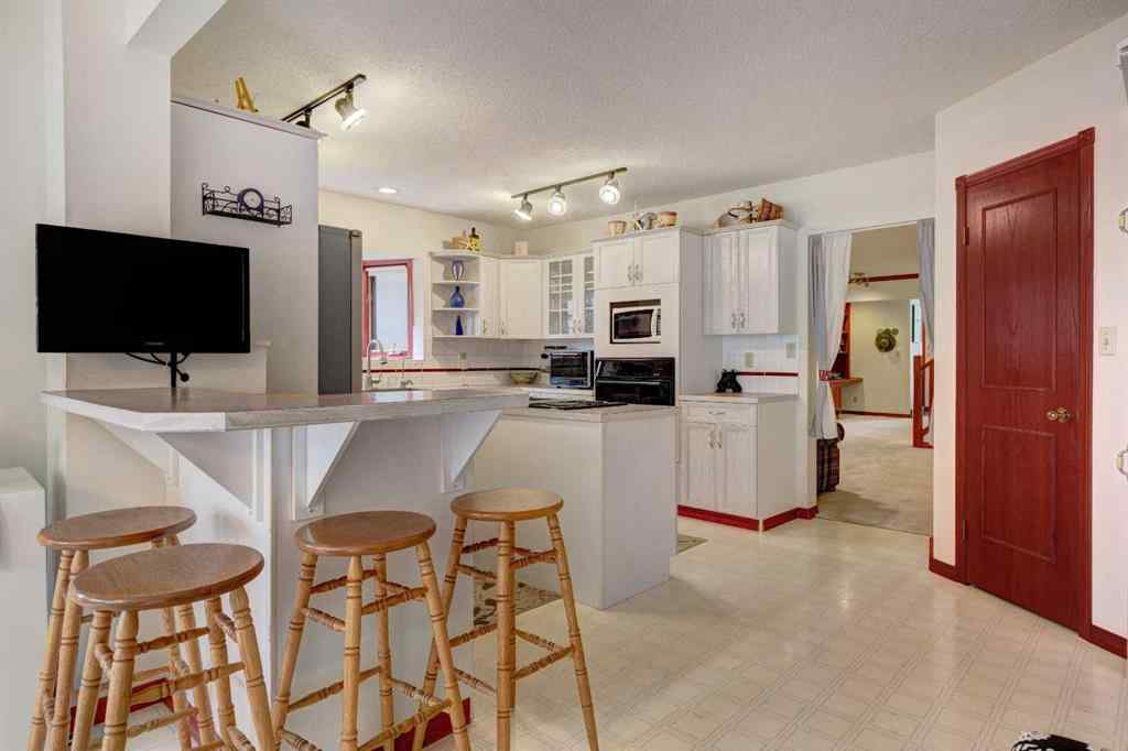 MLS® A2246547 - 328 Squirrel Street  in NONE Banff, Residential