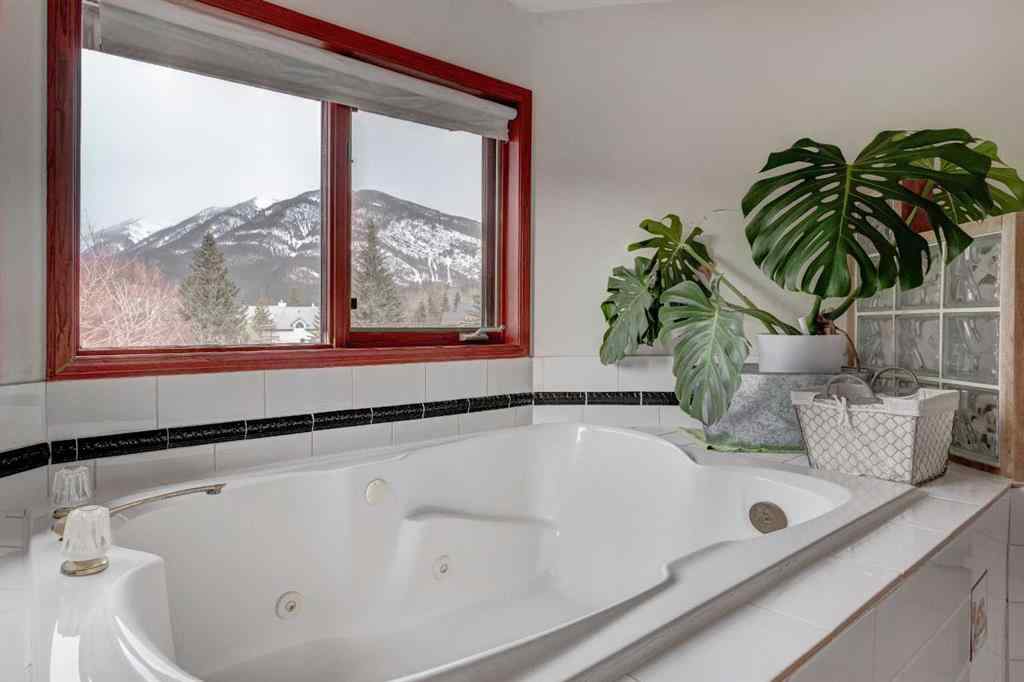 MLS® A2246547 - 328 Squirrel Street  in NONE Banff, Residential
