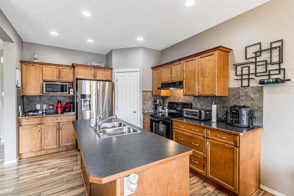 MLS® A2246572 - 14 Elgin Meadows Way SE in McKenzie Towne Calgary, Residential