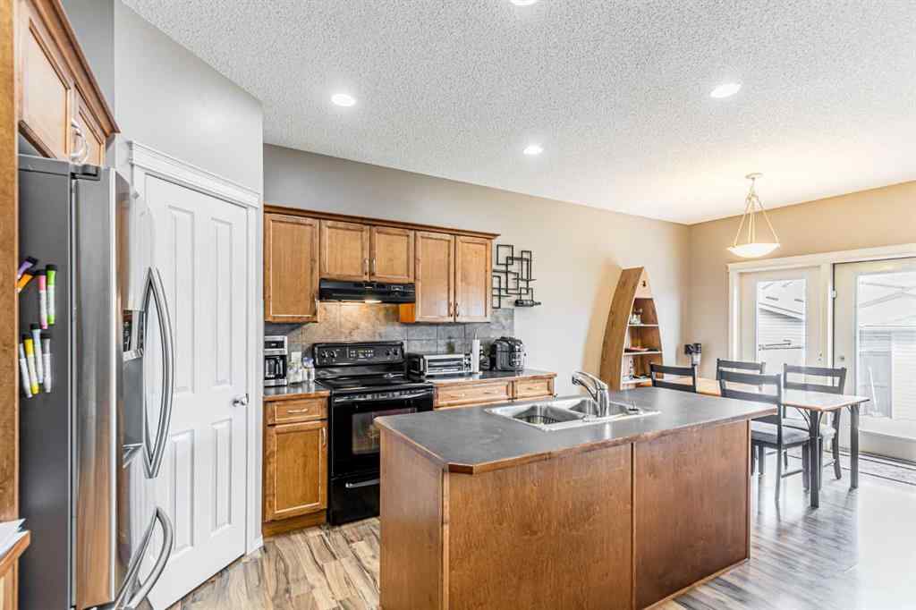 MLS® A2246572 - 14 Elgin Meadows Way SE in McKenzie Towne Calgary, Residential