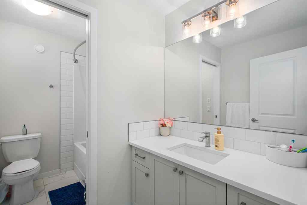 MLS® A2246575 - 261 Herron Mews NE in Livingston Calgary, Residential