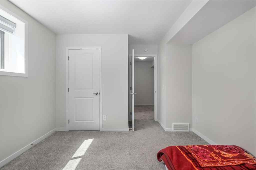 MLS® A2246575 - 261 Herron Mews NE in Livingston Calgary, Residential