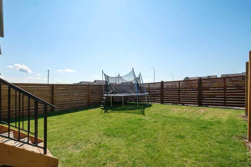 MLS® A2246575 - 261 Herron Mews NE in Livingston Calgary, Residential