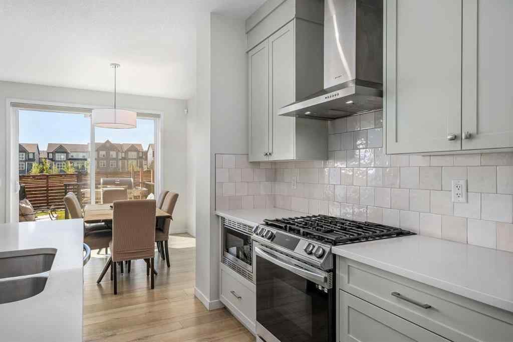 MLS® A2246575 - 261 Herron Mews NE in Livingston Calgary, Residential