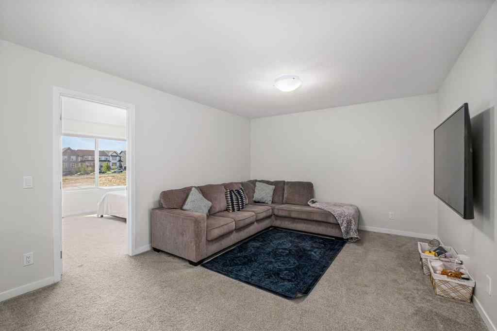 MLS® A2246575 - 261 Herron Mews NE in Livingston Calgary, Residential