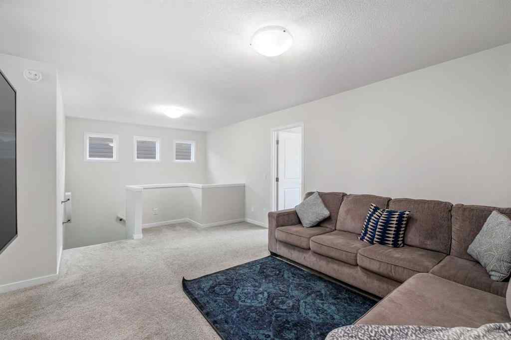 MLS® A2246575 - 261 Herron Mews NE in Livingston Calgary, Residential