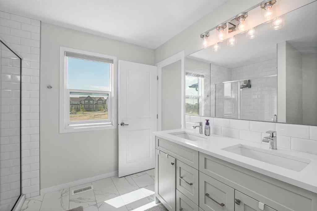 MLS® A2246575 - 261 Herron Mews NE in Livingston Calgary, Residential