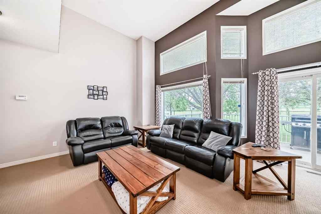 MLS® A2246602 - 104 Kingsland Court SW in Kingsland Calgary, Residential