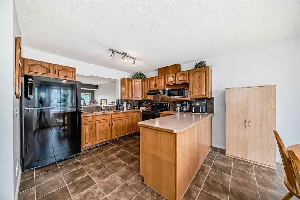 MLS® A2246602 - 104 Kingsland Court SW in Kingsland Calgary, Residential