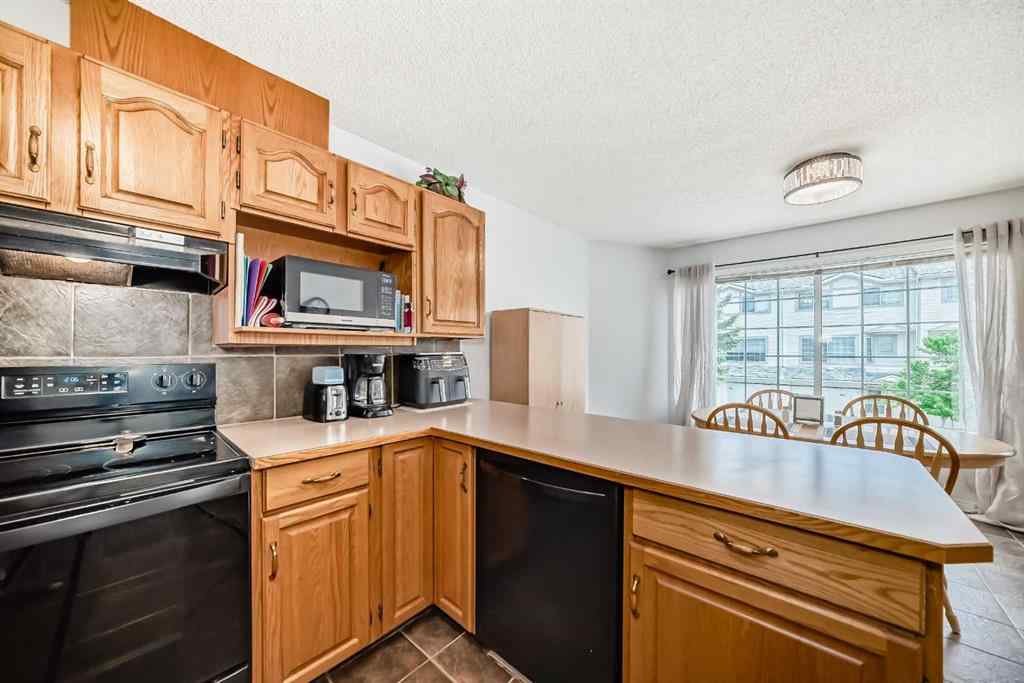 MLS® A2246602 - 104 Kingsland Court SW in Kingsland Calgary, Residential