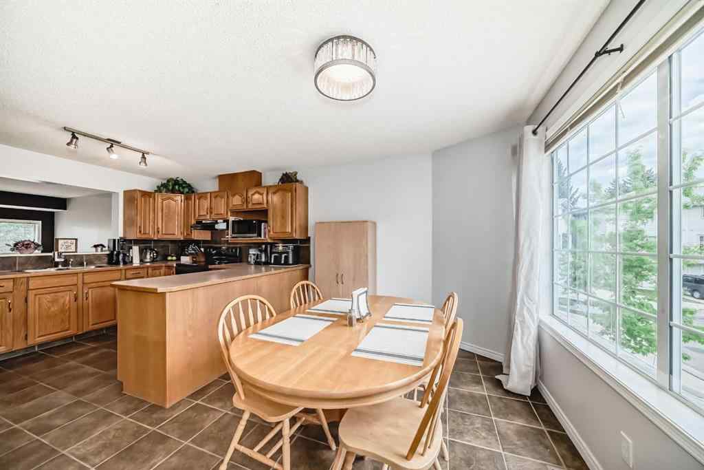 MLS® A2246602 - 104 Kingsland Court SW in Kingsland Calgary, Residential