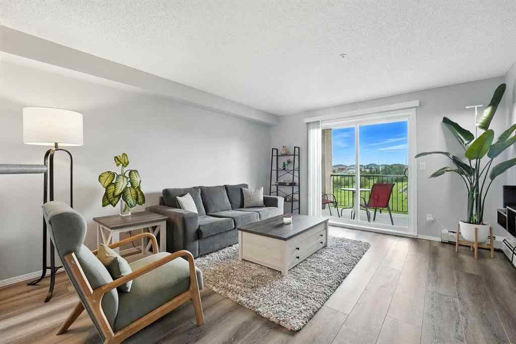 MLS® A2246603 - Unit #7204 304 Mackenzie Way SW in Downtown Airdrie, Residential