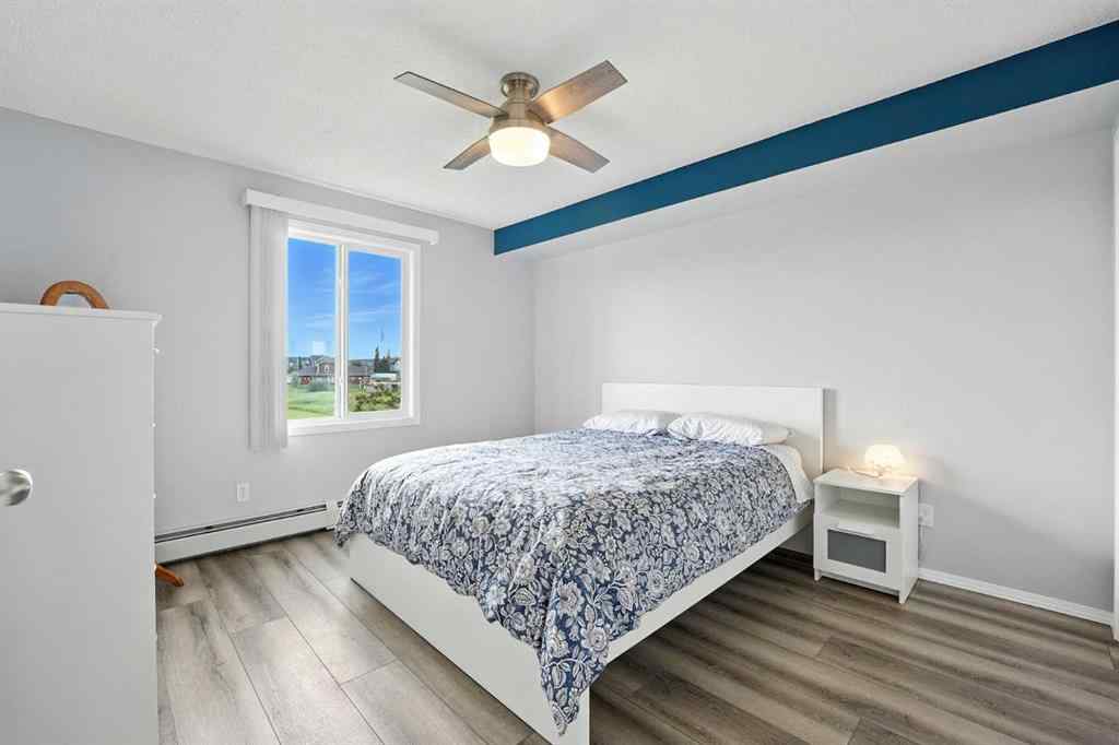 MLS® A2246603 - Unit #7204 304 Mackenzie Way SW in Downtown Airdrie, Residential