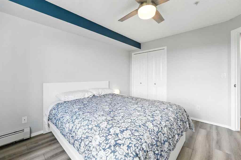 MLS® A2246603 - Unit #7204 304 Mackenzie Way SW in Downtown Airdrie, Residential