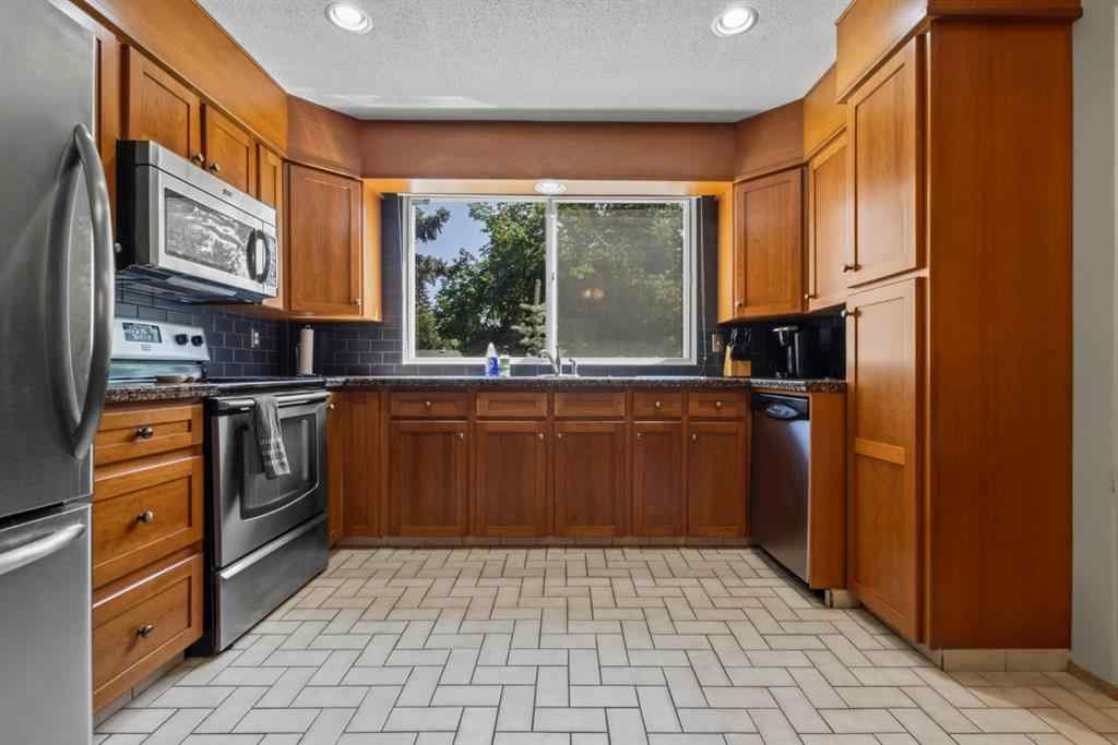 MLS® A2246611 - 111 Canata Close SW in Canyon Meadows Calgary, Residential