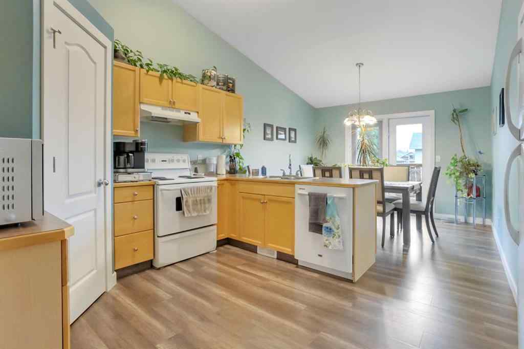 MLS® A2246634 - 219 Lancaster Drive  in Lancaster Green Red Deer, Residential