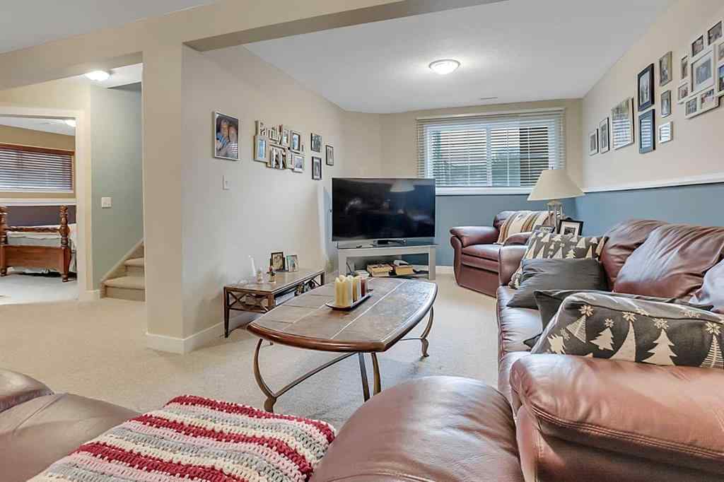 MLS® A2246634 - 219 Lancaster Drive  in Lancaster Green Red Deer, Residential
