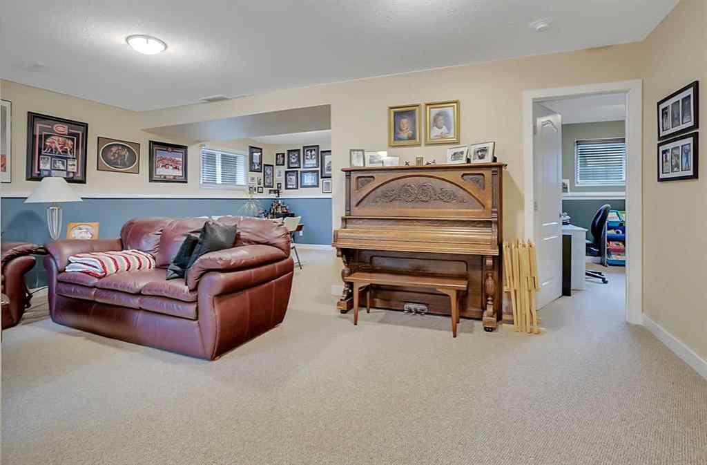 MLS® A2246634 - 219 Lancaster Drive  in Lancaster Green Red Deer, Residential