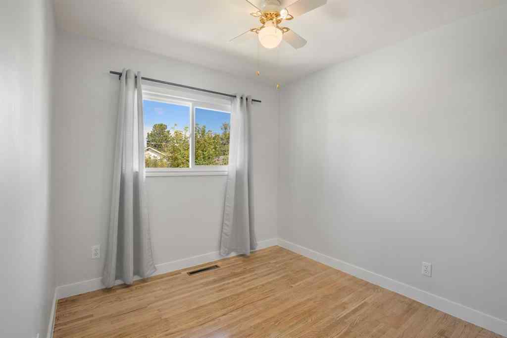 MLS® A2246637 - 4912 43 Street  in Central Innisfail Innisfail, Residential