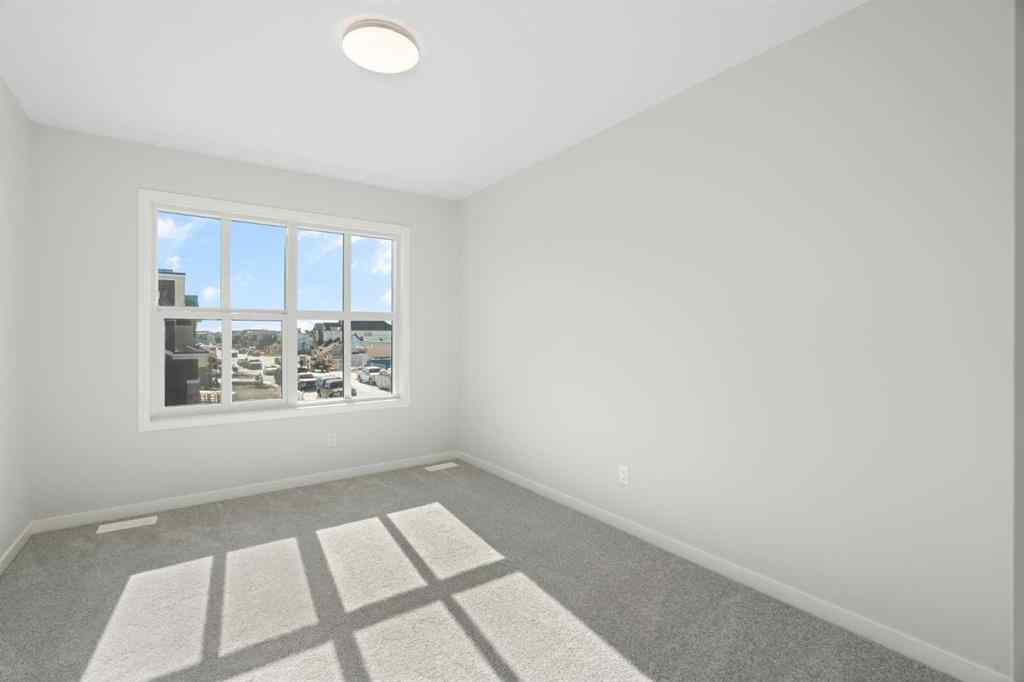 MLS® A2246646 - 136 Lucas Gardens NW in Livingston Calgary, Residential