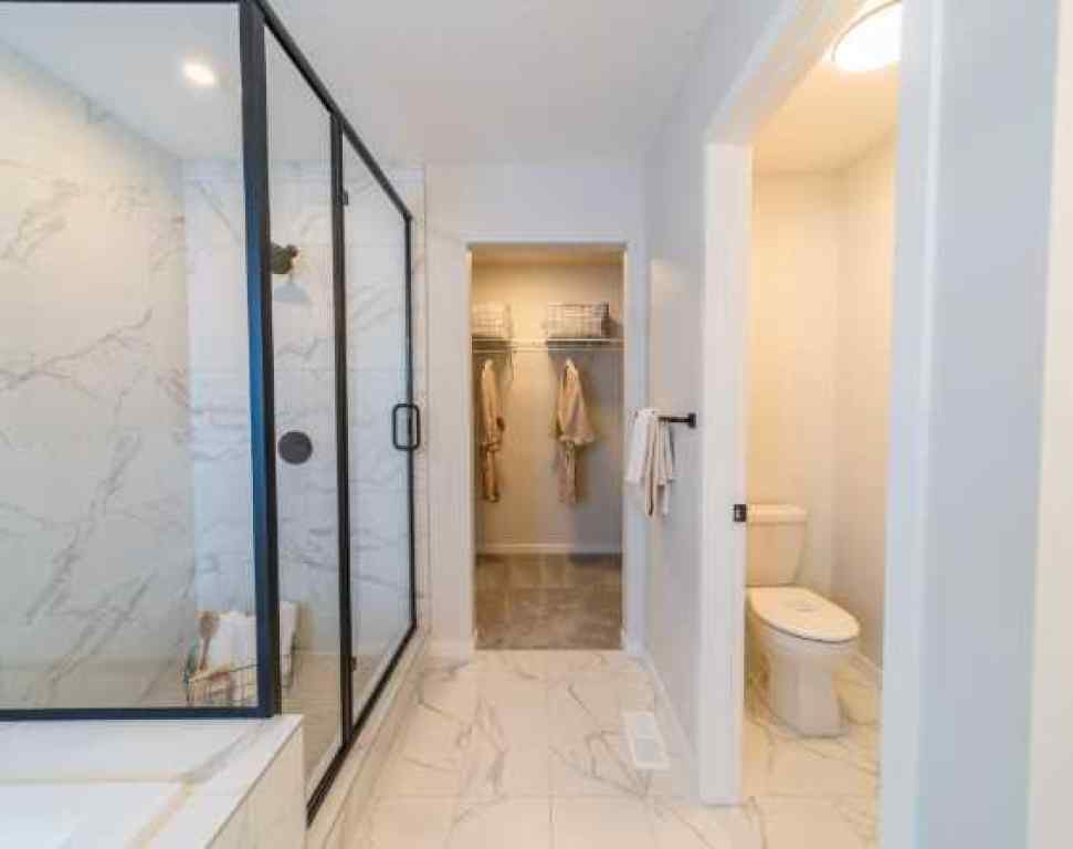 MLS® A2246646 - 136 Lucas Gardens NW in Livingston Calgary, Residential