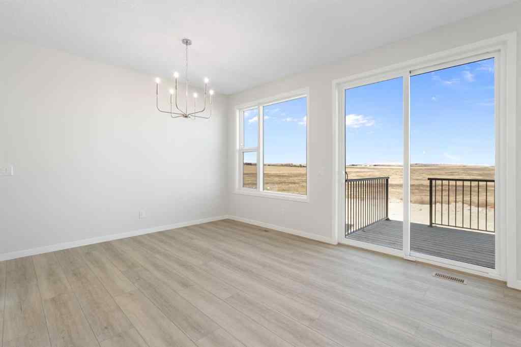 MLS® A2246646 - 136 Lucas Gardens NW in Livingston Calgary, Residential