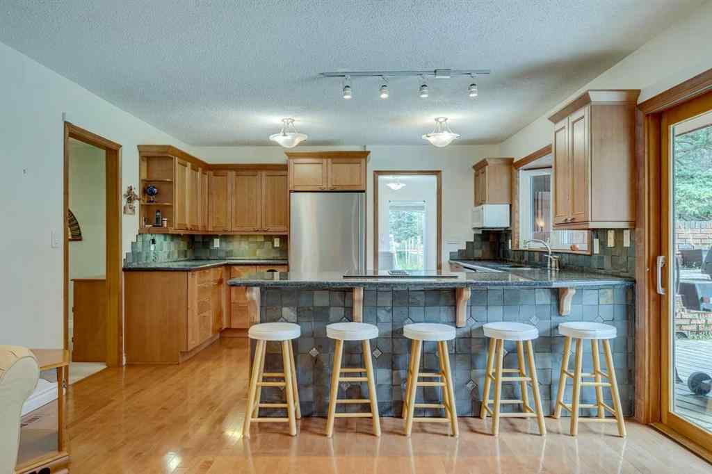 MLS® A2246657 - 28 Wolf Drive  in Redwood Meadows Rural Rocky View County, Residential