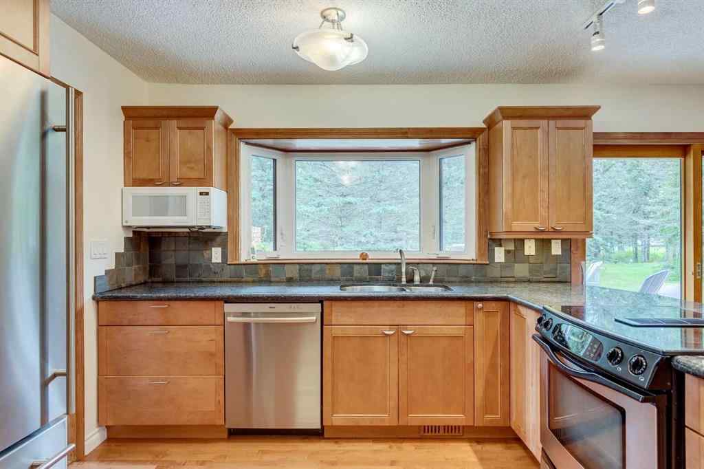 MLS® A2246657 - 28 Wolf Drive  in Redwood Meadows Rural Rocky View County, Residential