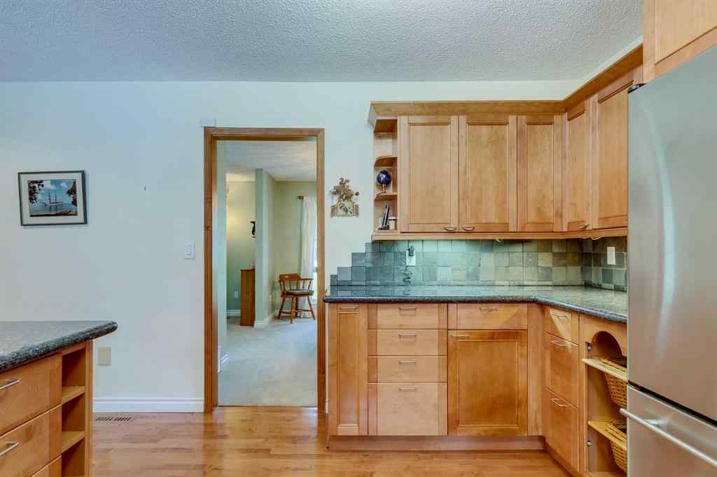 MLS® A2246657 - 28 Wolf Drive  in Redwood Meadows Rural Rocky View County, Residential