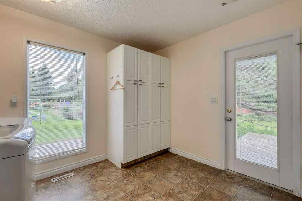 MLS® A2246657 - 28 Wolf Drive  in Redwood Meadows Rural Rocky View County, Residential