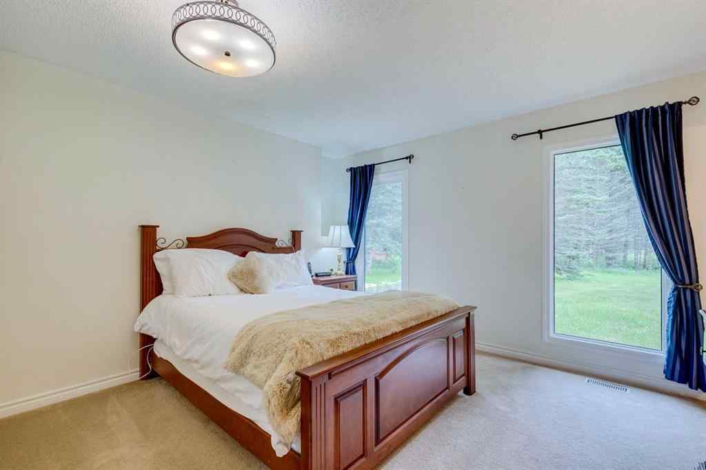 MLS® A2246657 - 28 Wolf Drive  in Redwood Meadows Rural Rocky View County, Residential