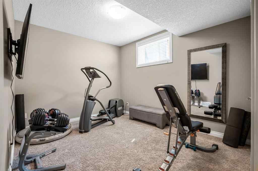MLS® A2246669 - 22 Monterra Way  in Monterra Rural Rocky View County, Residential