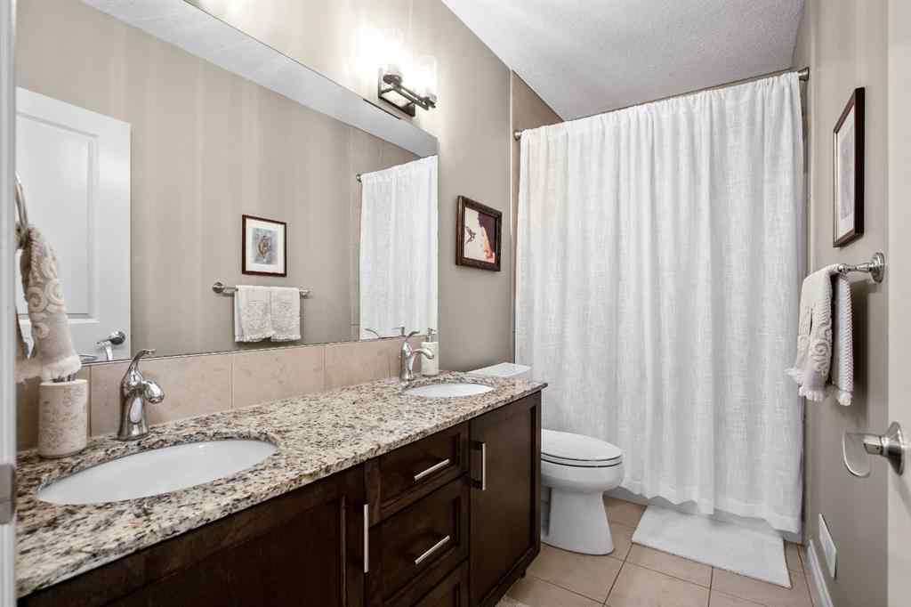 MLS® A2246669 - 22 Monterra Way  in Monterra Rural Rocky View County, Residential