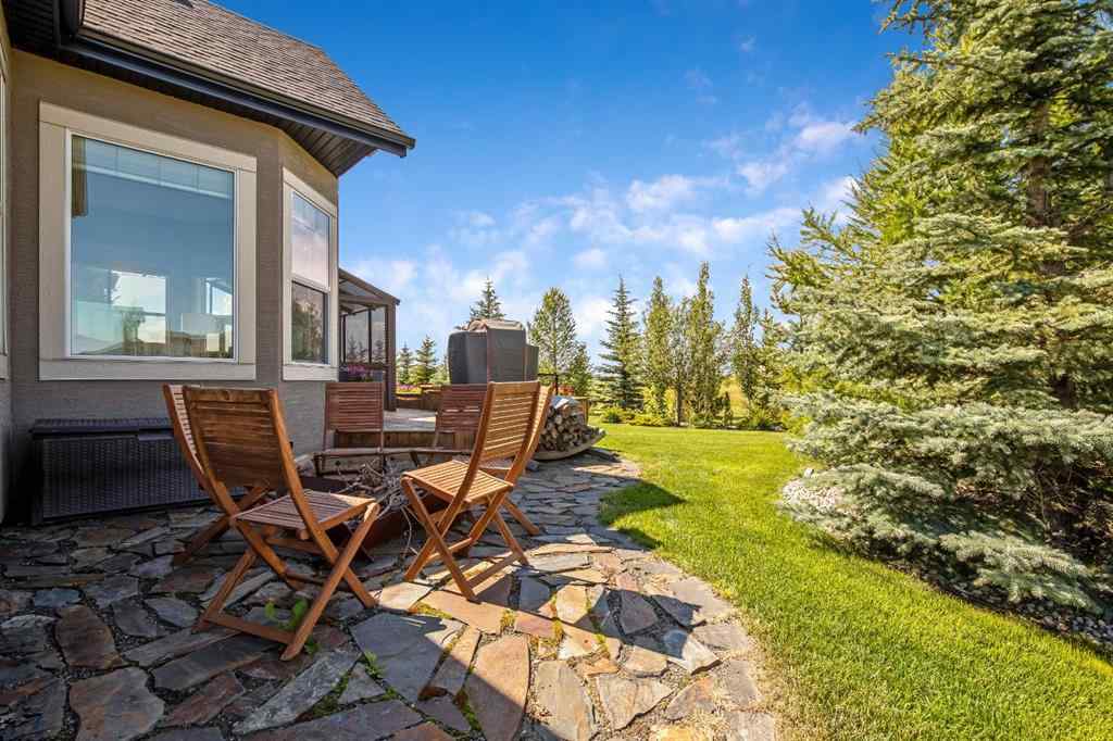 MLS® A2246669 - 22 Monterra Way  in Monterra Rural Rocky View County, Residential