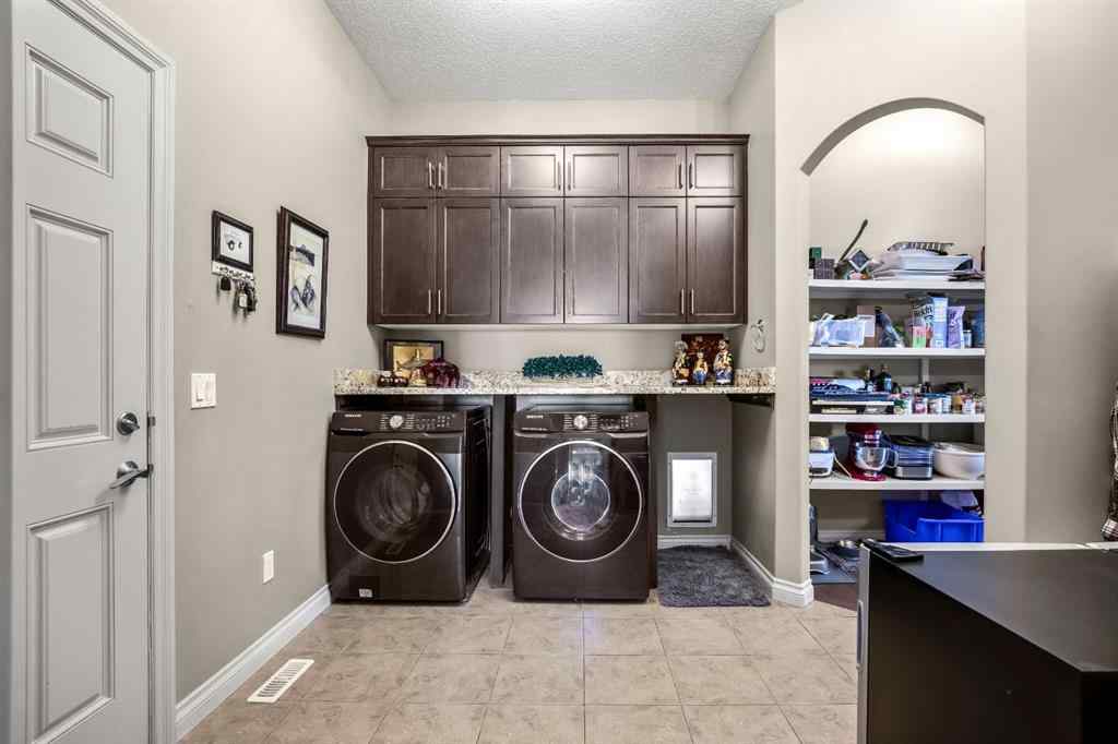 MLS® A2246669 - 22 Monterra Way  in Monterra Rural Rocky View County, Residential