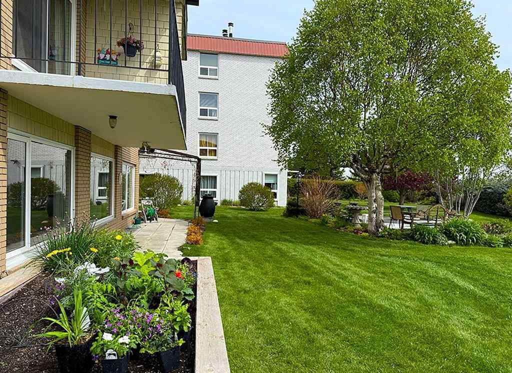 MLS® A2246717 - Unit #100 524 Cedar Crescent SW in Spruce Cliff Calgary, Residential
