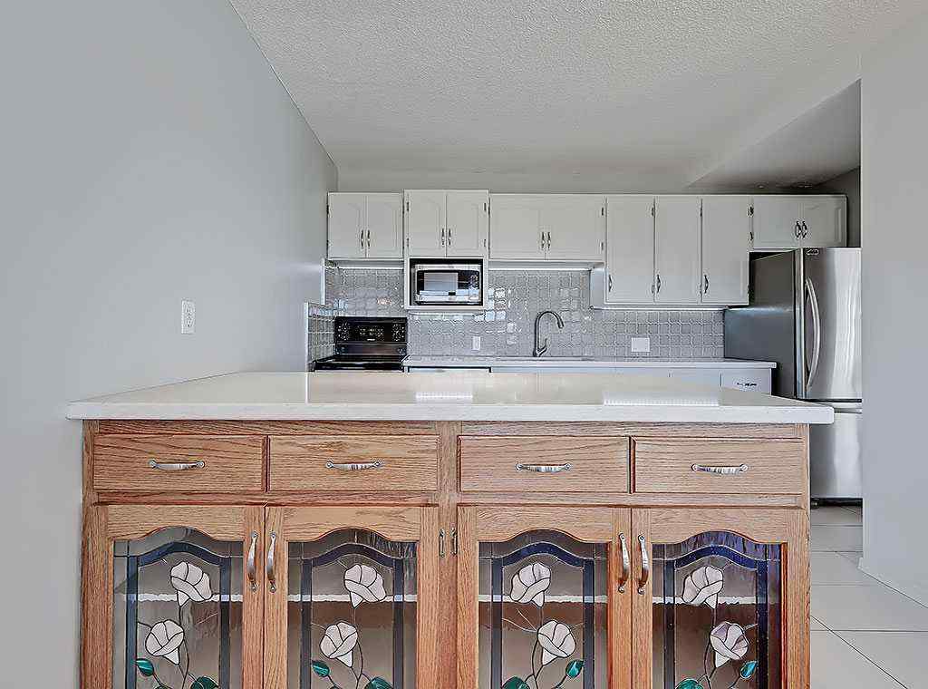 MLS® A2246717 - Unit #100 524 Cedar Crescent SW in Spruce Cliff Calgary, Residential
