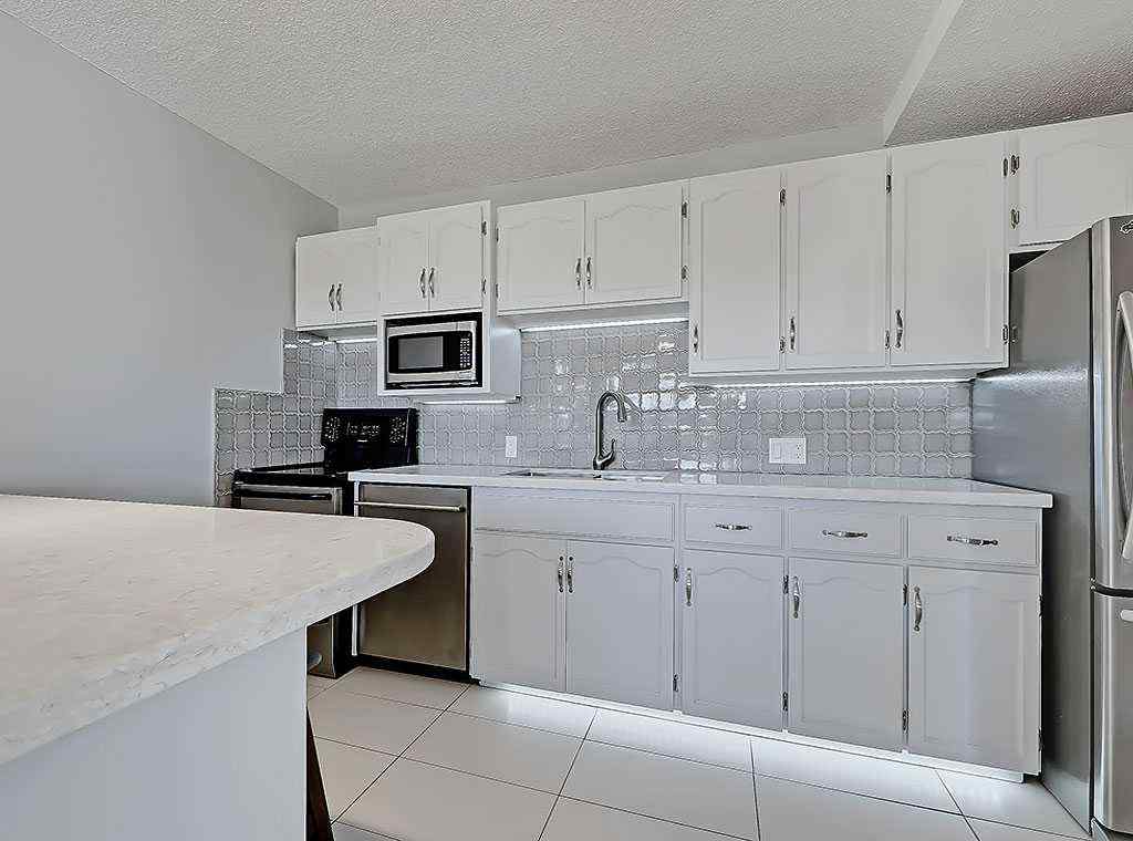 MLS® A2246717 - Unit #100 524 Cedar Crescent SW in Spruce Cliff Calgary, Residential