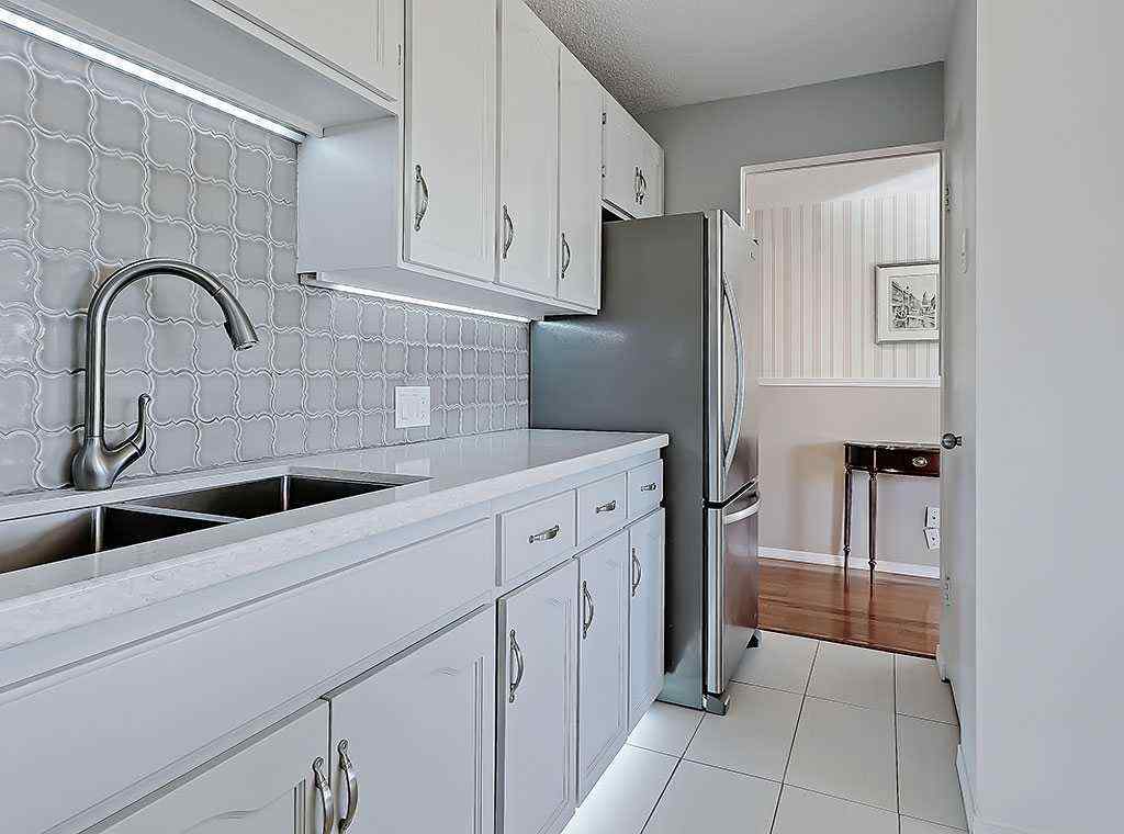 MLS® A2246717 - Unit #100 524 Cedar Crescent SW in Spruce Cliff Calgary, Residential